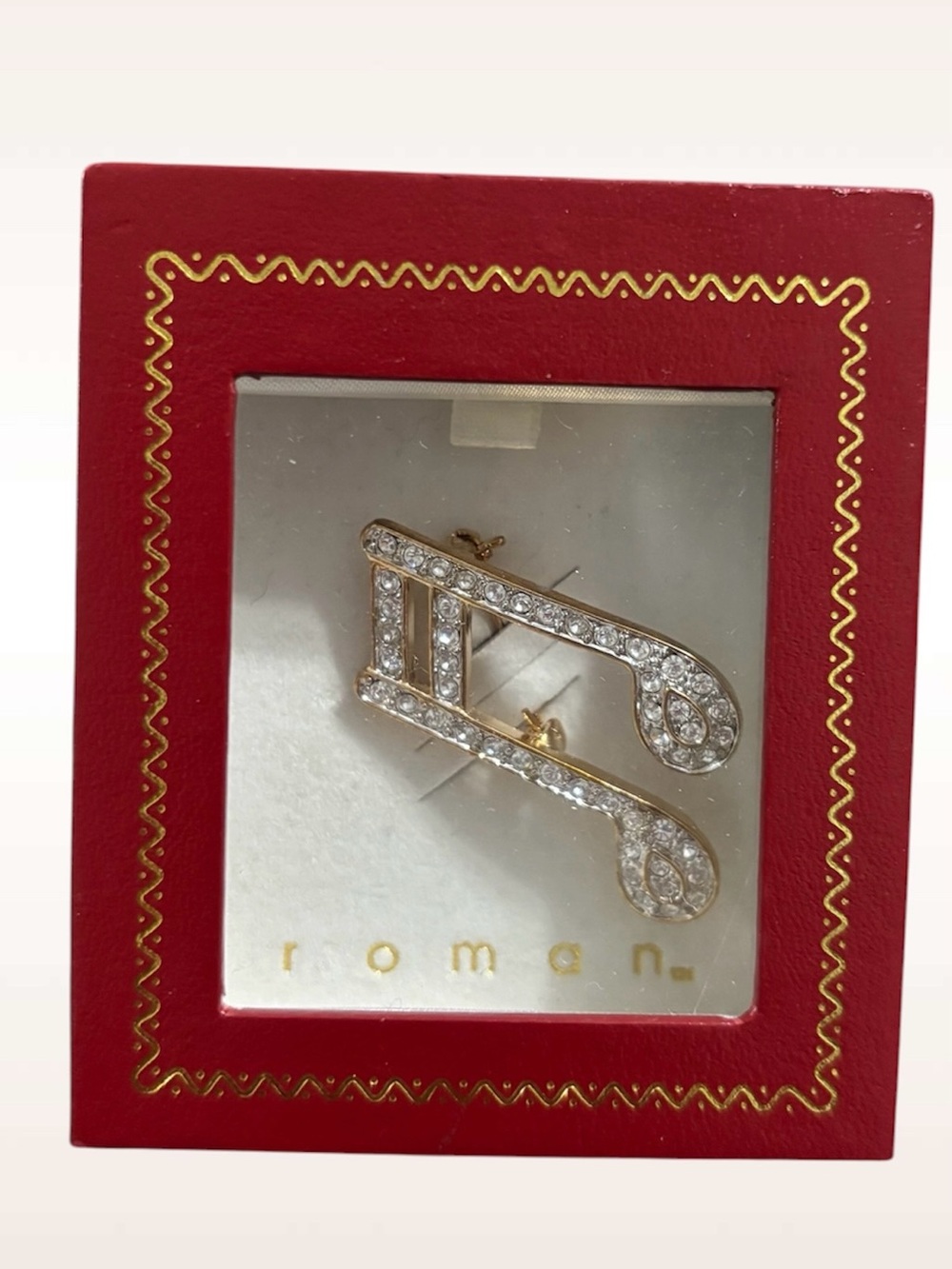 Roman Gold-Tone Musical Note Brooch with Clear Crystals